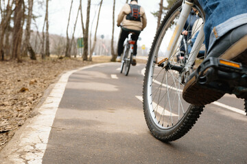 Fototapeta premium Girl on bicycle in Bitsa park, Moscow, Russia