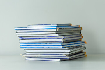 Many old books in a pile