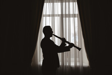 Man silhouette with clarinet