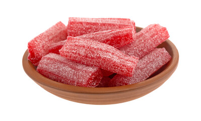 Gummy sweet and sour red candy in a small bowl isolated on a white background.