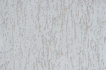 Light gray plastered  wall  textured background. 