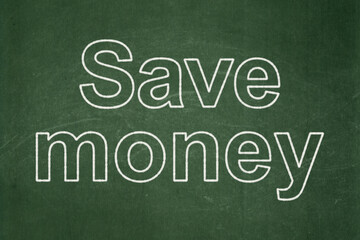 Fototapeta na wymiar Money concept: Save Money on chalkboard background