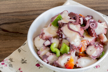 Octopus salad with vinaigrette sauce.