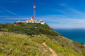 Fototapeta na wymiar Lighthouse over Atlantic Ocean at Cabo da Roca, Portugal