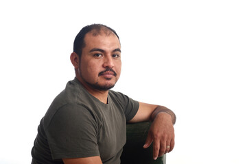 Fototapeta premium Portrait of a latin man on white background