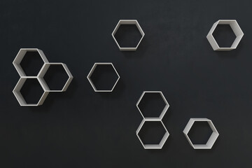 Empty dark or black wall with hexagon shelves on the wall, 3D rendering