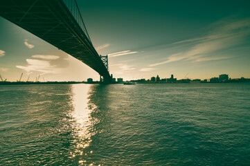 Sunrise bridge over water