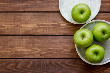 ripe green apples wooden table background top view space for text