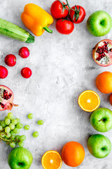 cooking salad with fresh fruits and vegetables on stone background top view mock-up