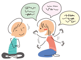 女性の話を笑顔で聞く男性