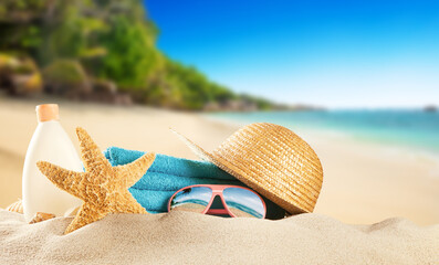 Tropical beach with accessories, summer holiday background.