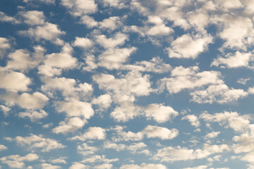 Clouds in clear blue sky