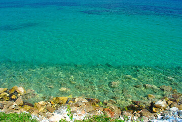 Beach with blue sea on sunny day on island Thassos