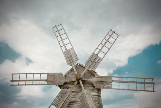 Wooden mill in outdoor ukrainian national falk historical village in Kiev