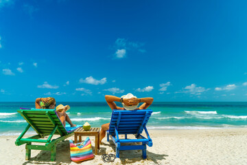 Couple on the beach at tropical resort Travel