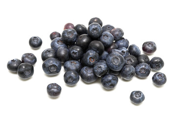 Ripe blueberries on white background.