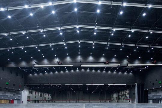 Large empty hall and lighting on ceiling.