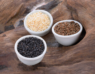 Sesame seeds on wooden floor