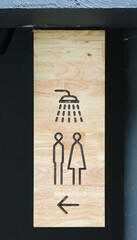 Shower sign on wood board with copy space.