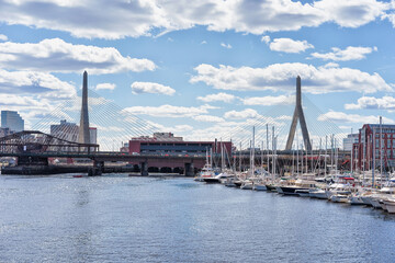 Obraz premium Pier with sailboats at Charles River Zakim Bridge Boston MA