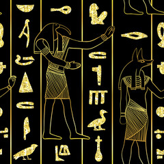 Seamless pattern with egyptian gods and ancient egyptian hieroglyphs with golden glitter foil texture on black background. Vintage hand drawn vector illustration