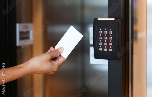 Door Access Control Young Woman Holding A Key Card To Lock