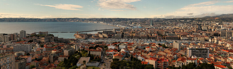 Fototapeta na wymiar Urban Panorama, Aerial View, Cityscape Of Marseille, France. Picturesque panoramic scene travel destination postcard. 