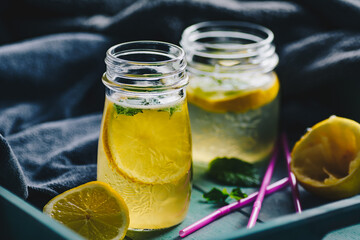Lemonade with fresh lemon and mint leaves