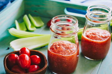 Cherry tomatoes smoothie with celery and black pepper.