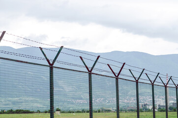 Tall Barbed Wire Border Fence 