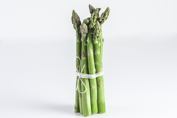 Sheaf of asparagus on a white background isolated