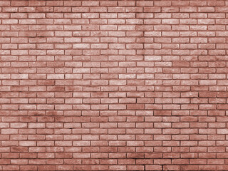 an old red toned brick wall with repeating pattern