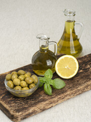 olive oil with green olives,vegetarian food.  