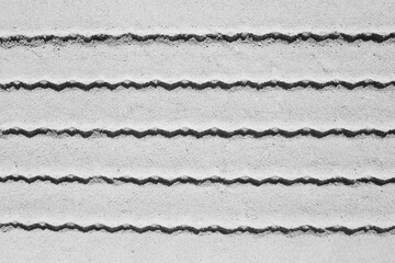 Abstract tire tracks on sand. Background and texture for design.