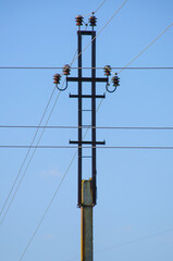 Supports for overhead power transmission lines