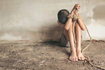 Stop abusing boy violence. child bondage , violence, terrified , A fearful child , Human Rights Day concept.