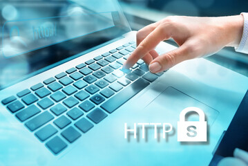 Closeup of businesswoman hand using computer laptop keyboard with written HHTP and locker icon...