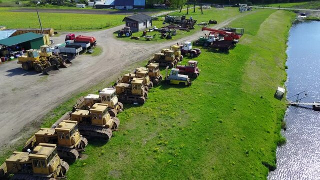 Tractors bulldozer technics at lake coast Aerial view, drone top view