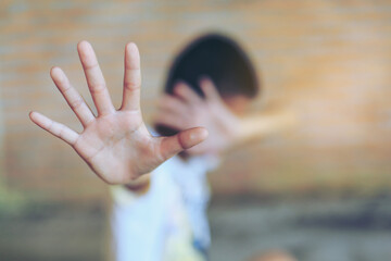 Stop abusing boy violence. child bondage , violence, terrified , A fearful child , Human Rights Day concept.
