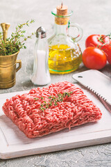 Minced meat with seasoning and fresh thyme