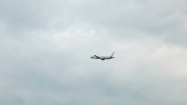 white passenger plane taking off from the airport
