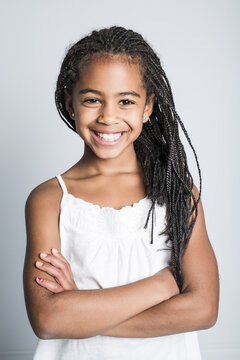 Adorable african little girl on studio gray background
