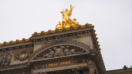 Fototapeta na wymiar Photo of Opera , Palais Garnier on a cloudy spring morning, Paris, France