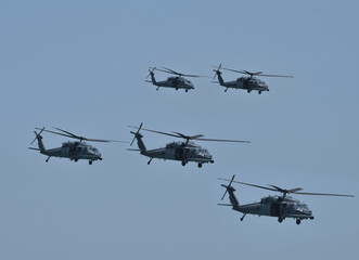 Military helicopters in flight