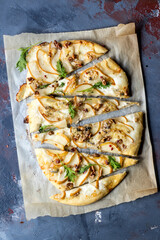 Homemade pizza with pear and gorgonzola on a gray table - 157417058