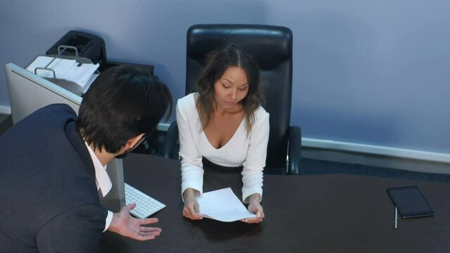 Business colleagues arguing in office