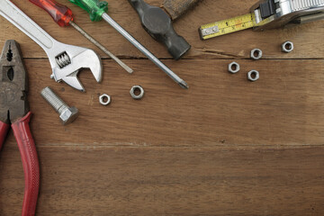 Mechanic tool / View of mechanic tool with copy space on wood background. Top view.
