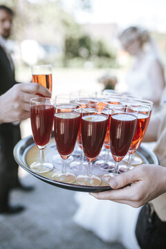 Waiter serving champagne in the wedding