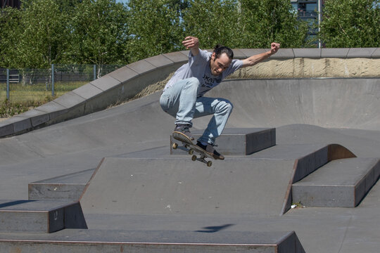 Skateboarder In Mid Air Action