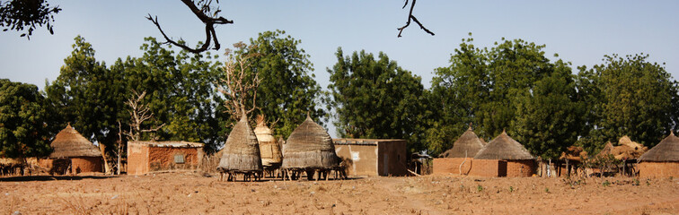 African village huts - obrazy, fototapety, plakaty